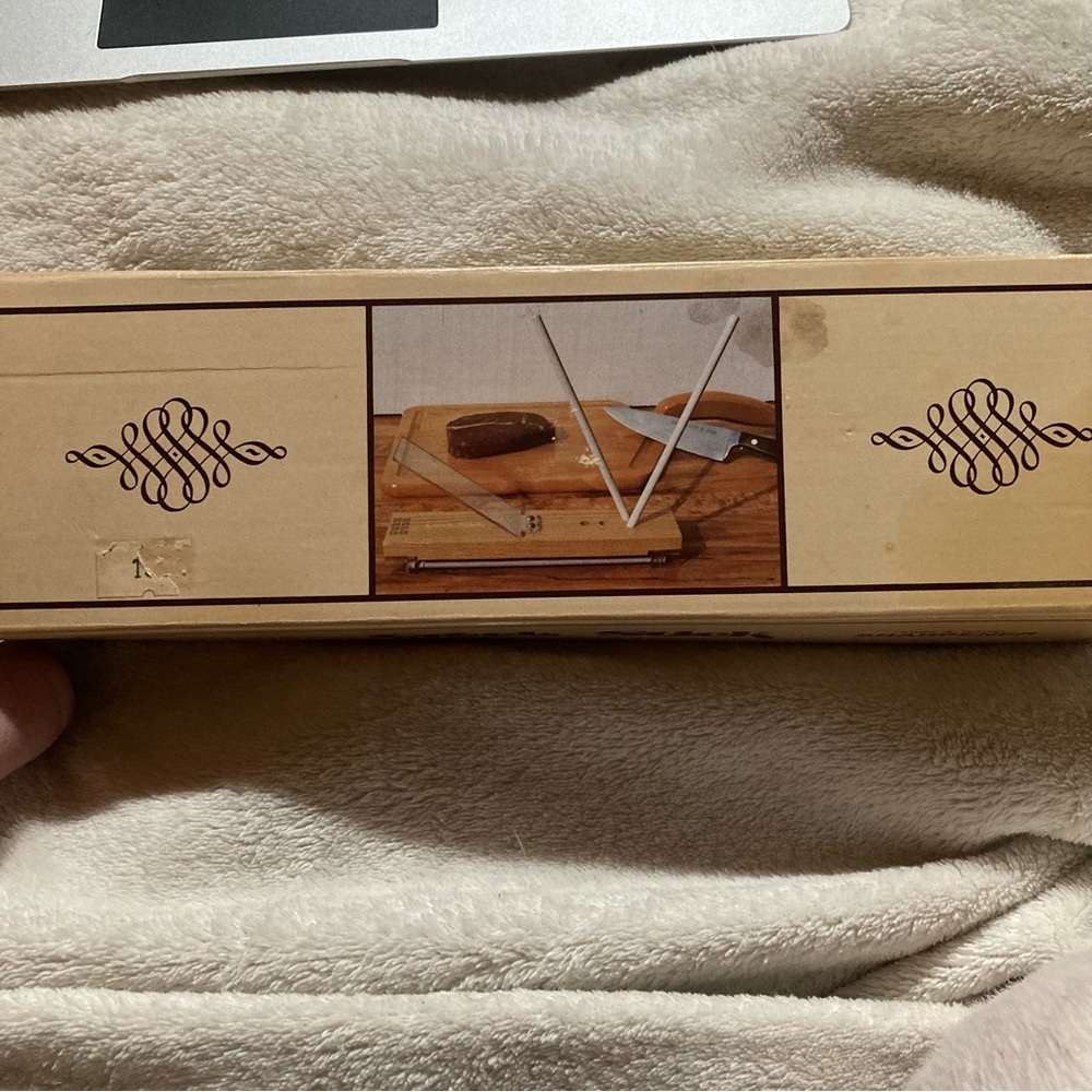 Vintage two stage crock stick knife and scissor sharpener with four rods.